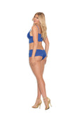 Stretch lace booty shorts and a matching camisole top embellished with satin bows. Adjustable straps.